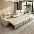  convertible sofa bed in beige leatherette with centre console, cup holders, USB port, and pull-out bed function