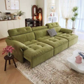 green sofa bed couch with plush seating and relaxed lounge profile