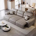 Light grey 3 seater pull-out sofa bed with leatherette finish, vertical channel stitching, pillow-top arms, and modern sofa cumm bed design