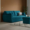  teal blue pull-out sofa bed with tufted backrest, rounded armrests, matching ottoman, and compact couch bed design