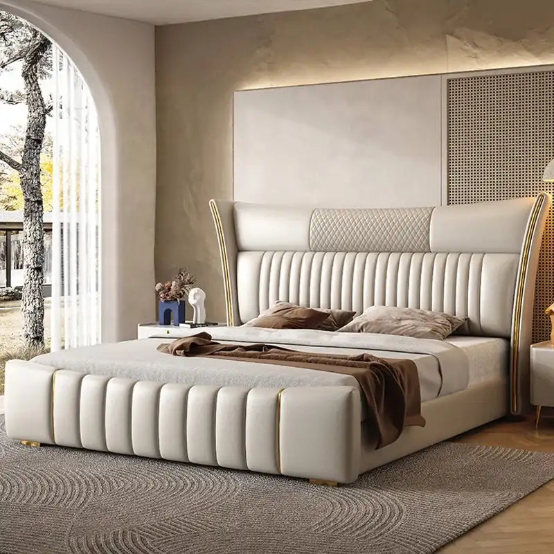 Feska upholstered bed with king size bed comfort, diamond quilted wingback headboard, gold accent detailing and modern bed frame styling for master bedrooms