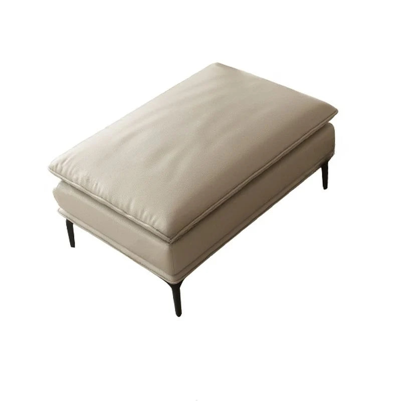 Its compact rectangular shape and low seating height make it an easy addition to a living area without crowding the layout