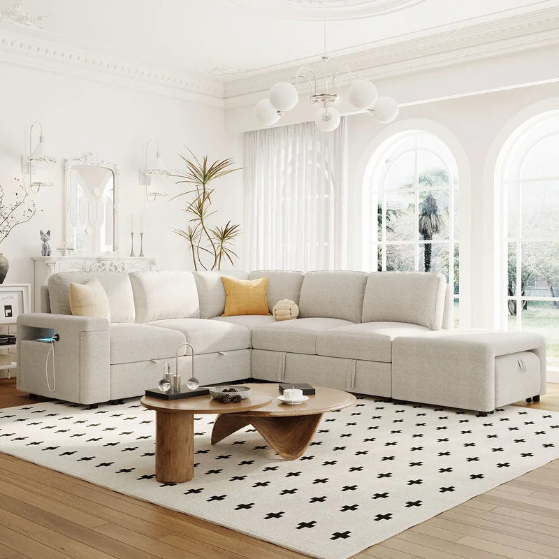 Sofa cam bed with storage, USB charging port, reversible chaise, pull-out sleeper mechanism, matching ottoman, and side pocket storage
